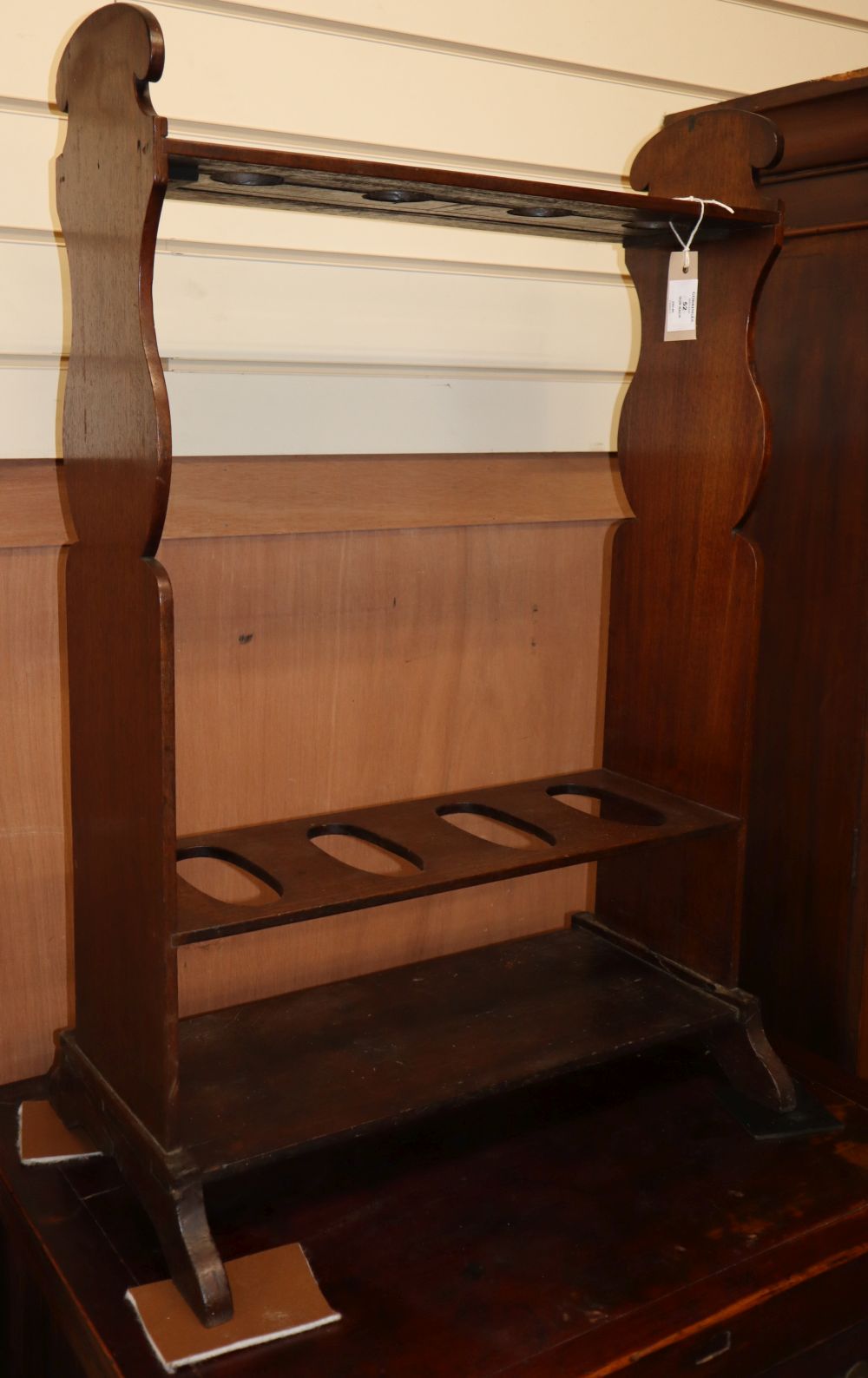 A late Victorian mahogany gun rack, W.56cm D.34cm H.86cm